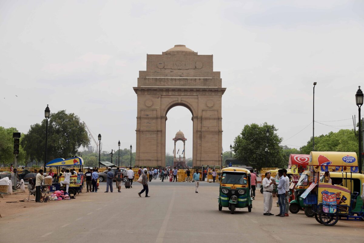 The India gate with tuk-tuks in front is one of the landmarks in Delhi