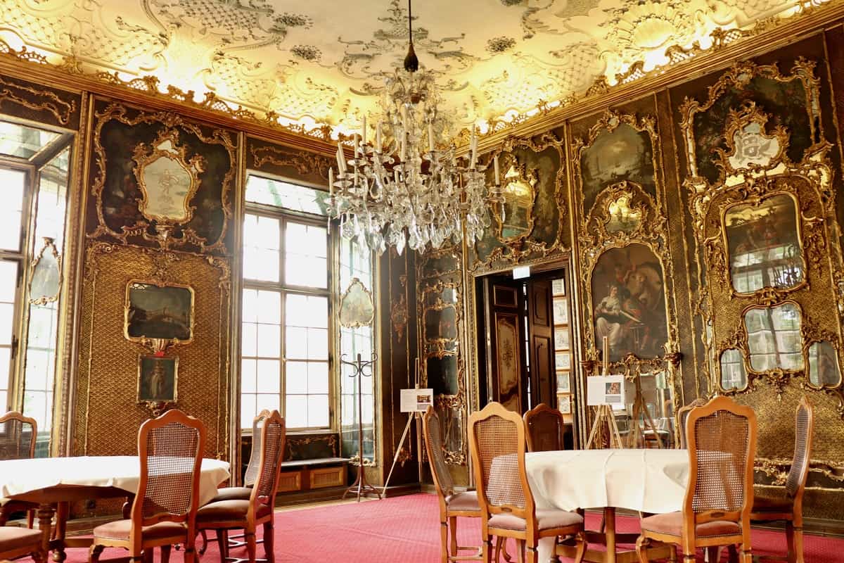 View of the richly decorated Venetian Room inside the Castle Schloss Leopoldskron. 