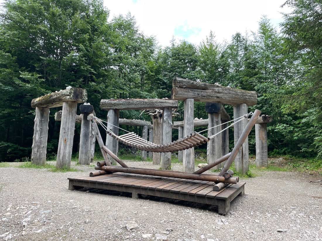 The Leutasch Gorge Circular Trail End is marked by a wooden stonehenge.