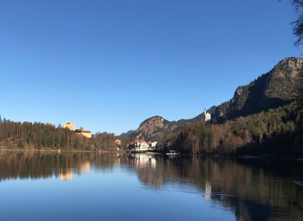 Alpsee lake with Hohenschwangau Castle, hotel and Neuschwanstein Castle