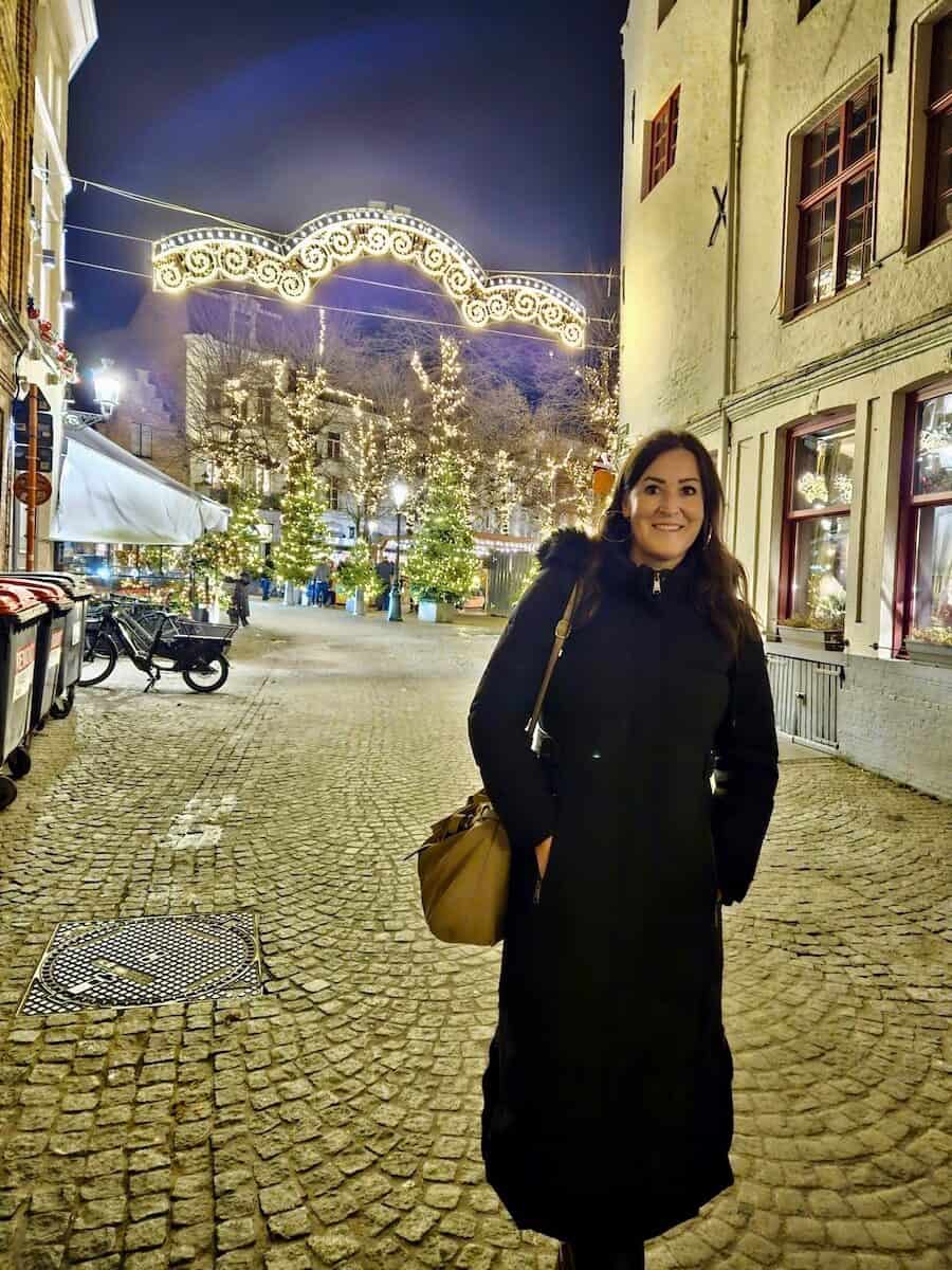 Author Christina from Cityseacountry during a winter trip to Bruges in Belgium
